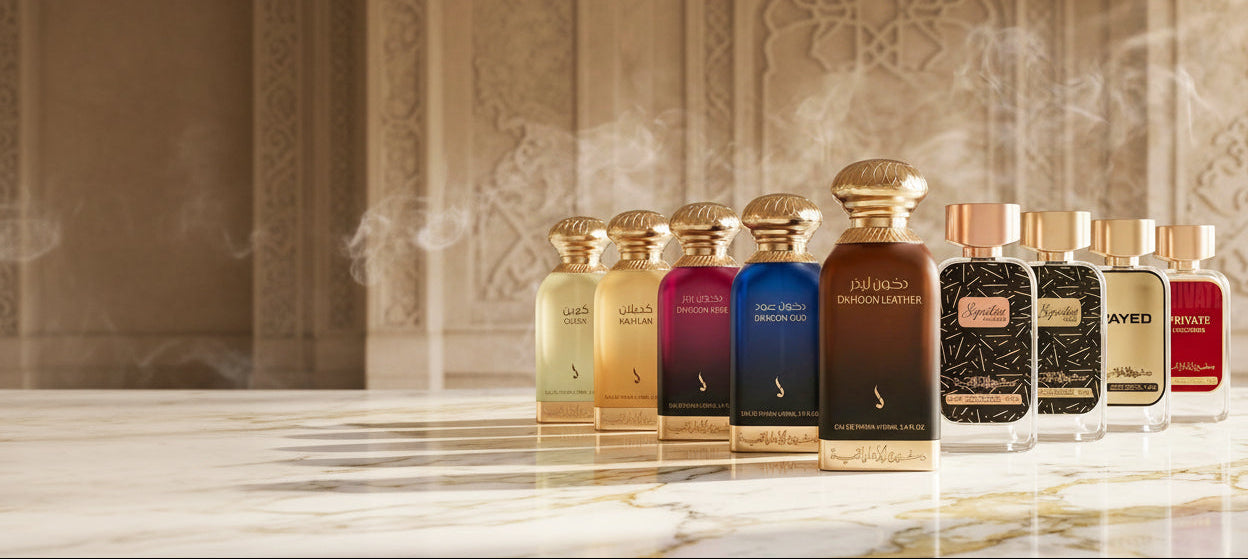 Dkhoon Al Emiratia perfume bottles displayed on a marble surface with promotional text.